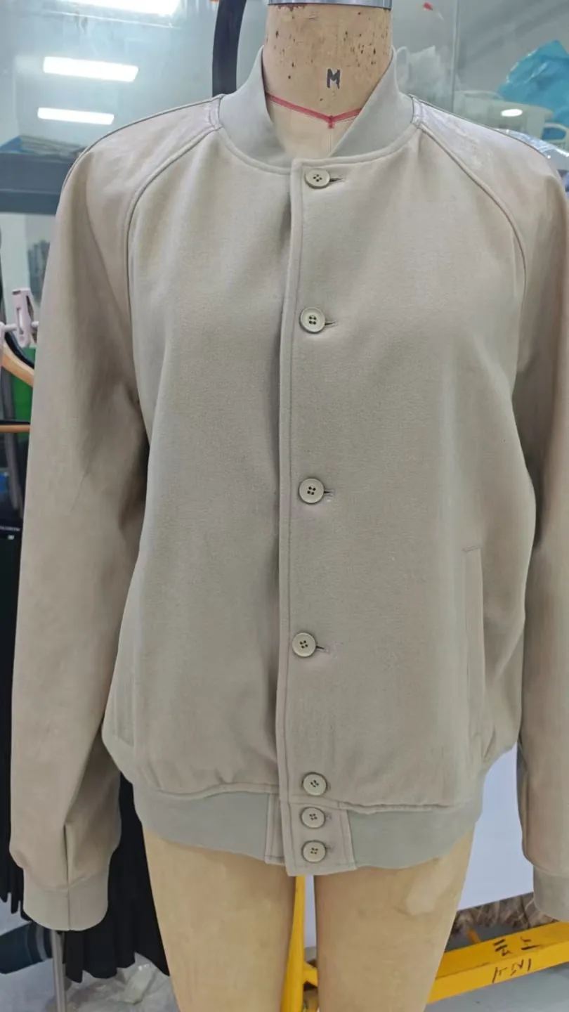 Lightweight button front jacket sample on a dress form