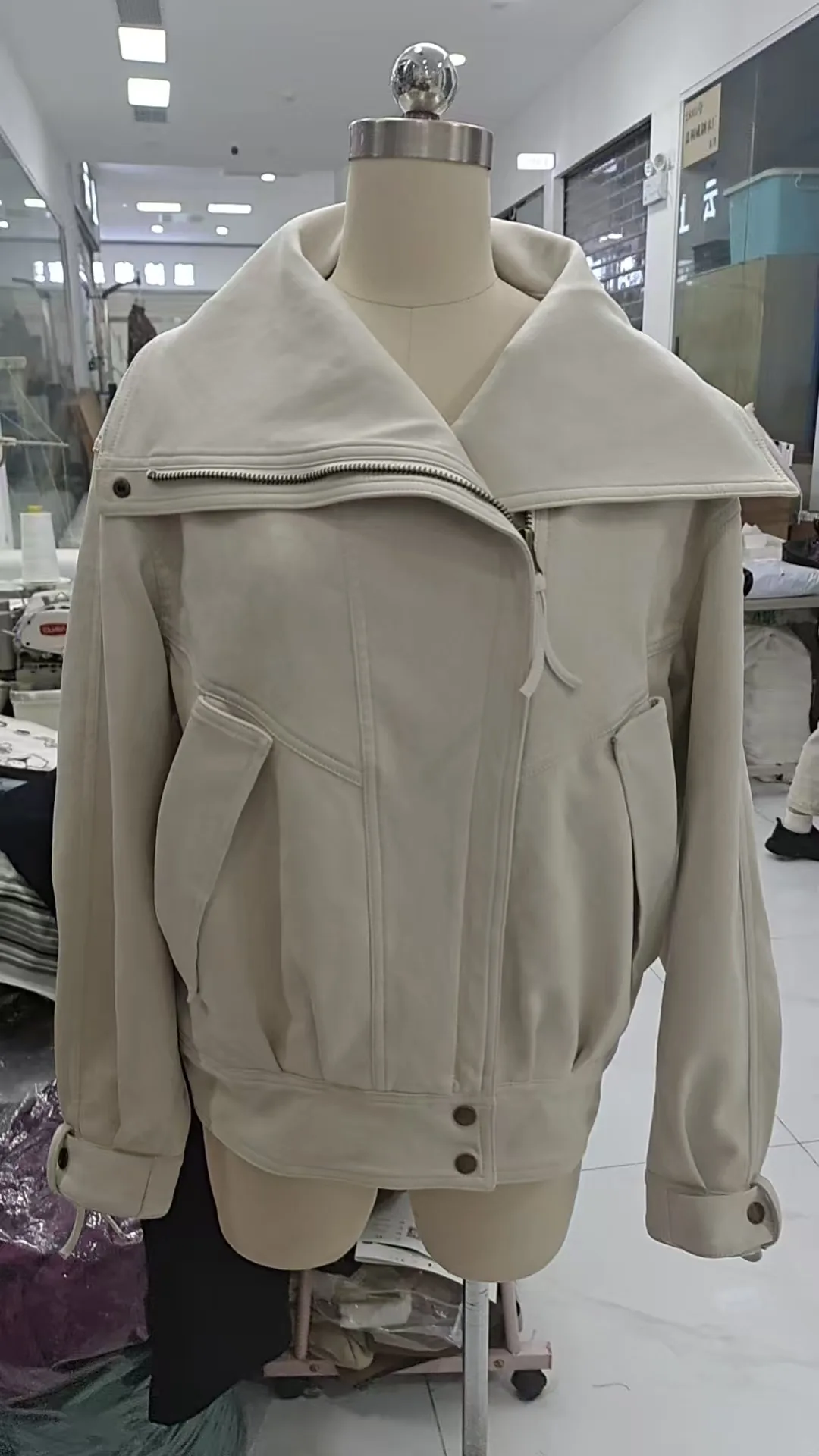 Oversized collar jacket sample on a dress form