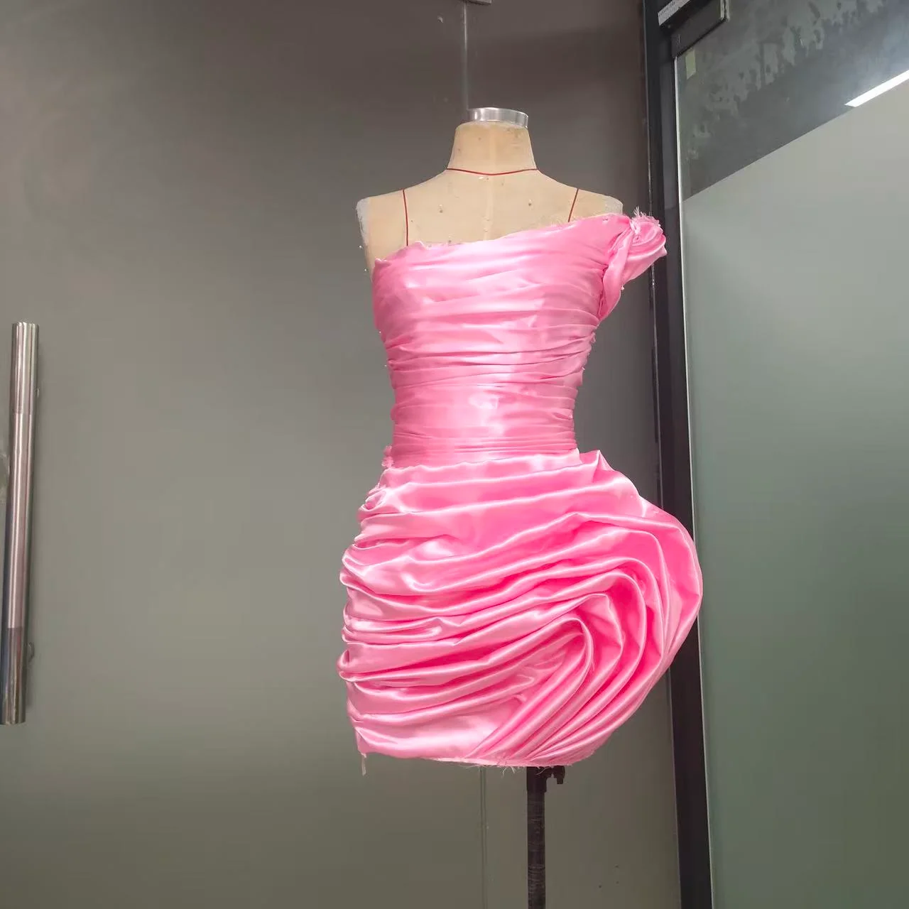 Pink revised toile showing the gathered skirt