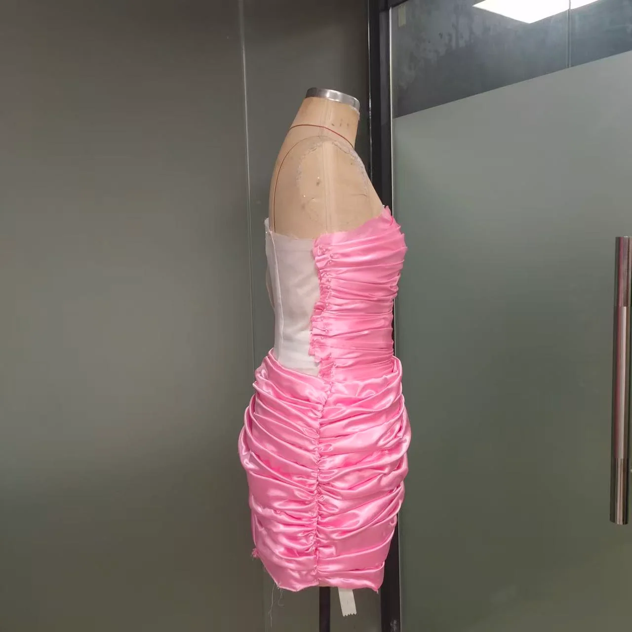 Pink revised toile in side profile