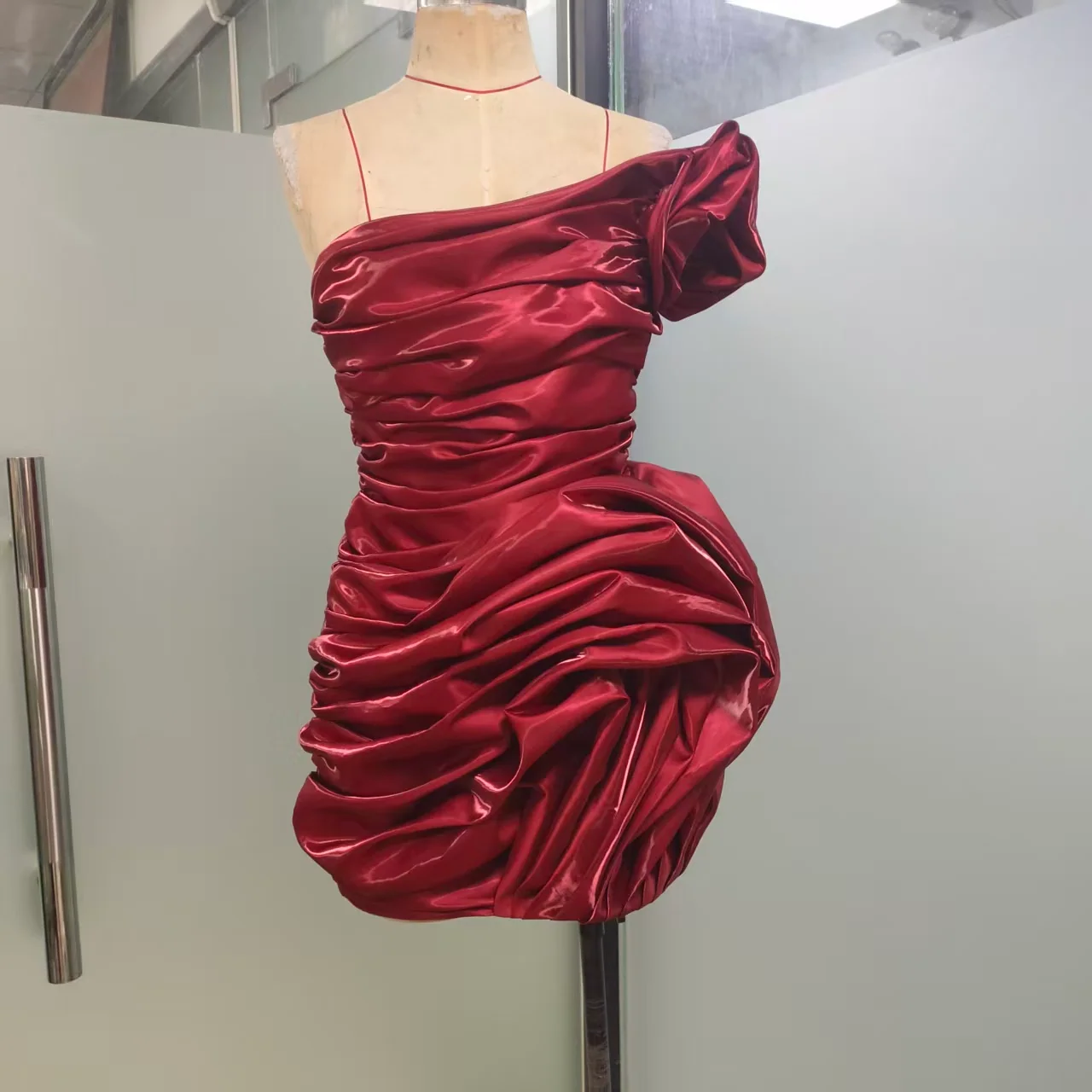 Final burgundy one-shoulder ruched dress from the front