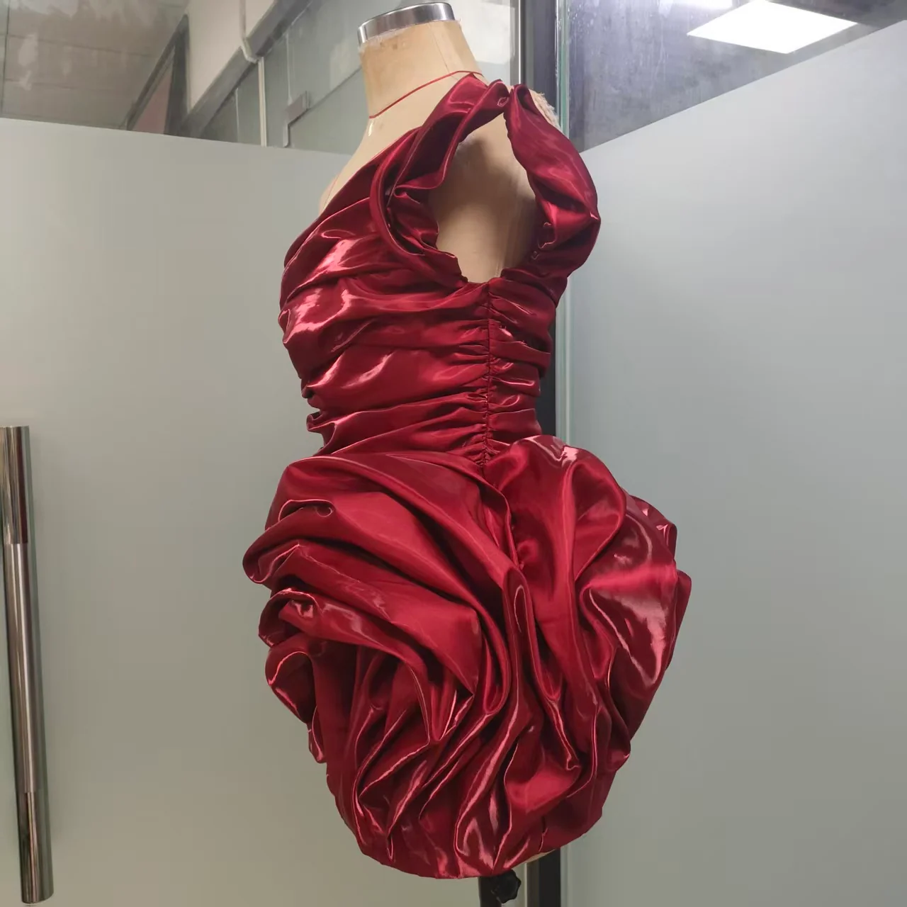 Final burgundy dress viewed from the side