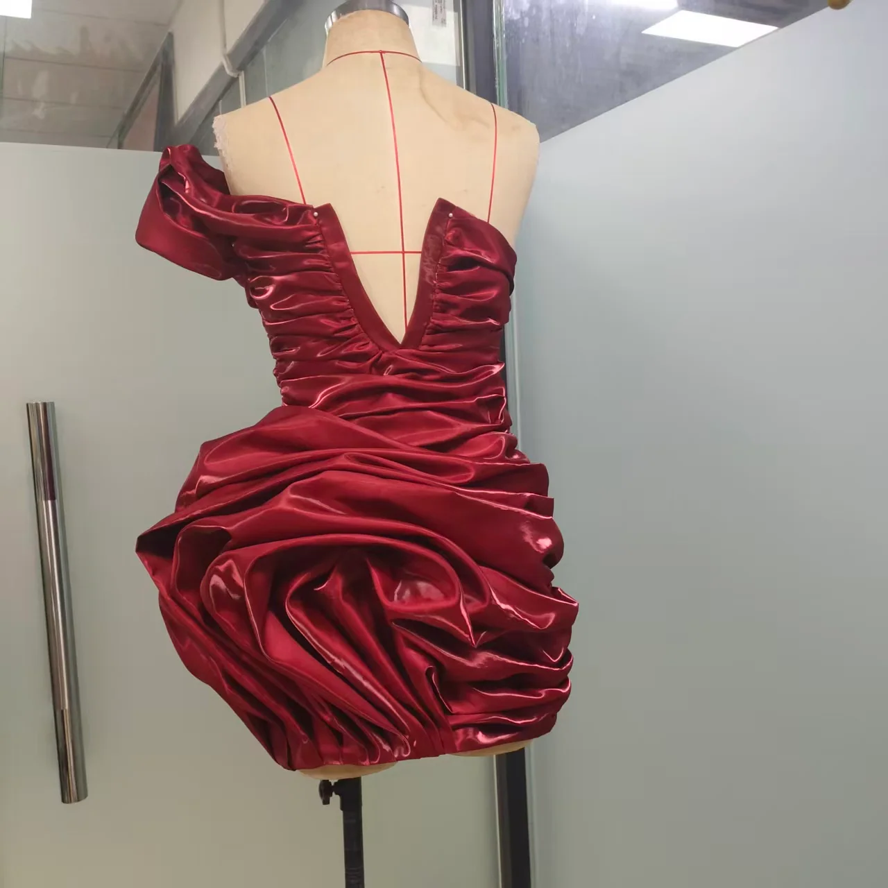 Final burgundy dress viewed from the back